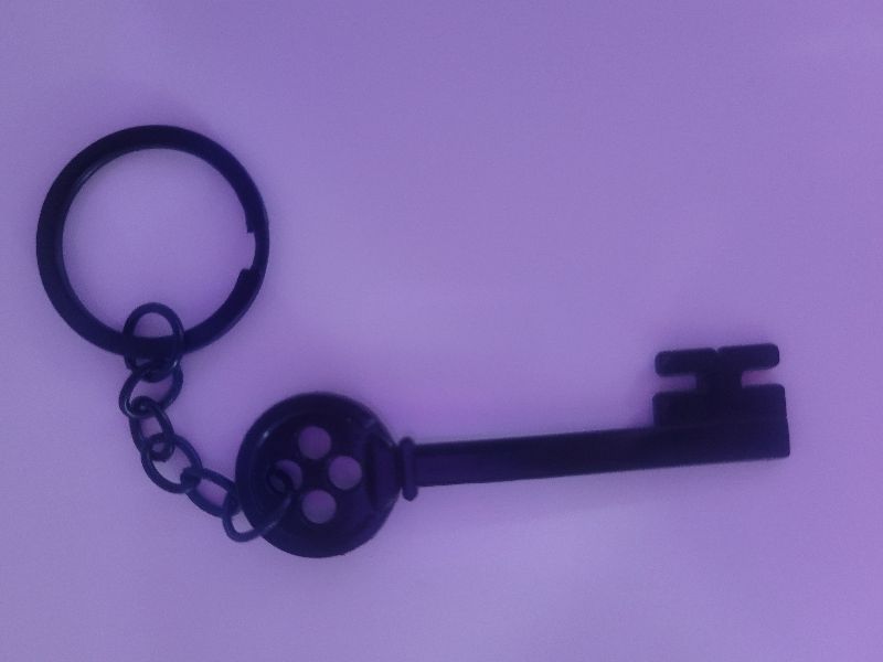 Llavero de llave coraline