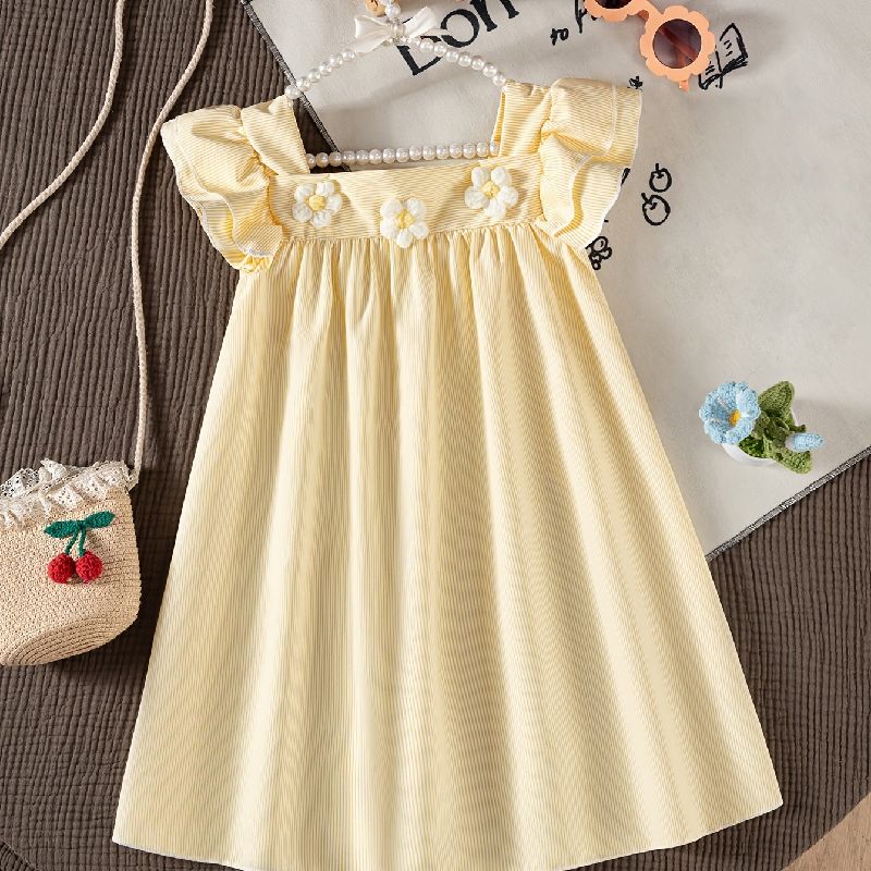 VESTIDO AMARILLO CON FLORES FRONTALES