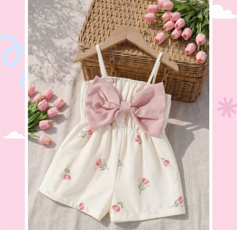 ENTERIZO BLANCO FLORAL CON LAZO GRANDE