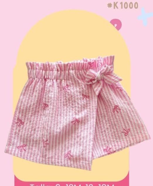 SHORT ROSA A RAYAS ESTAMPADO DE LAZOS