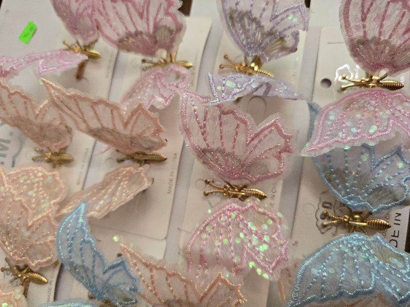 PRENSAPELO DE MARIPOSA