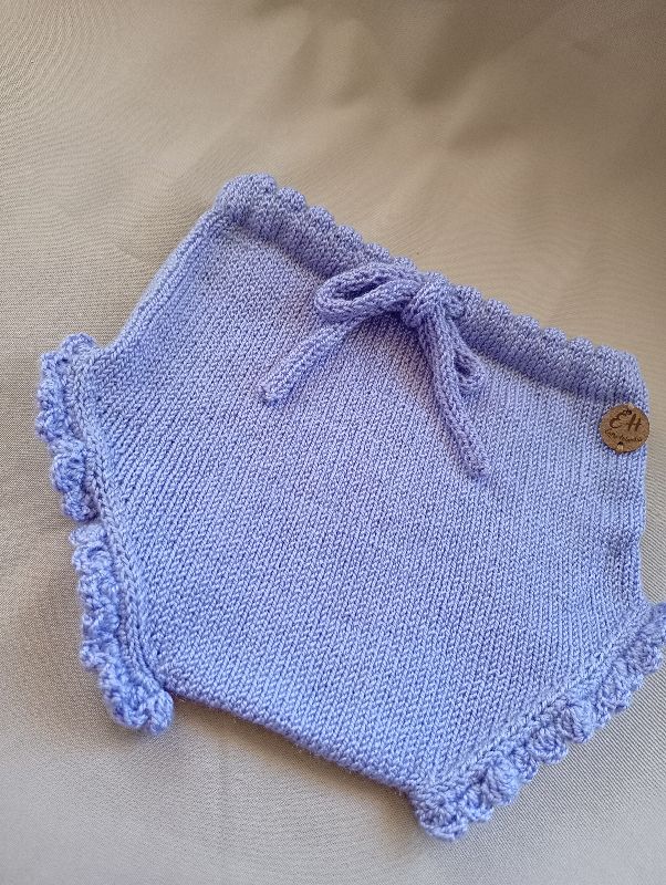 Cubrepañal violeta 6 -12 meses