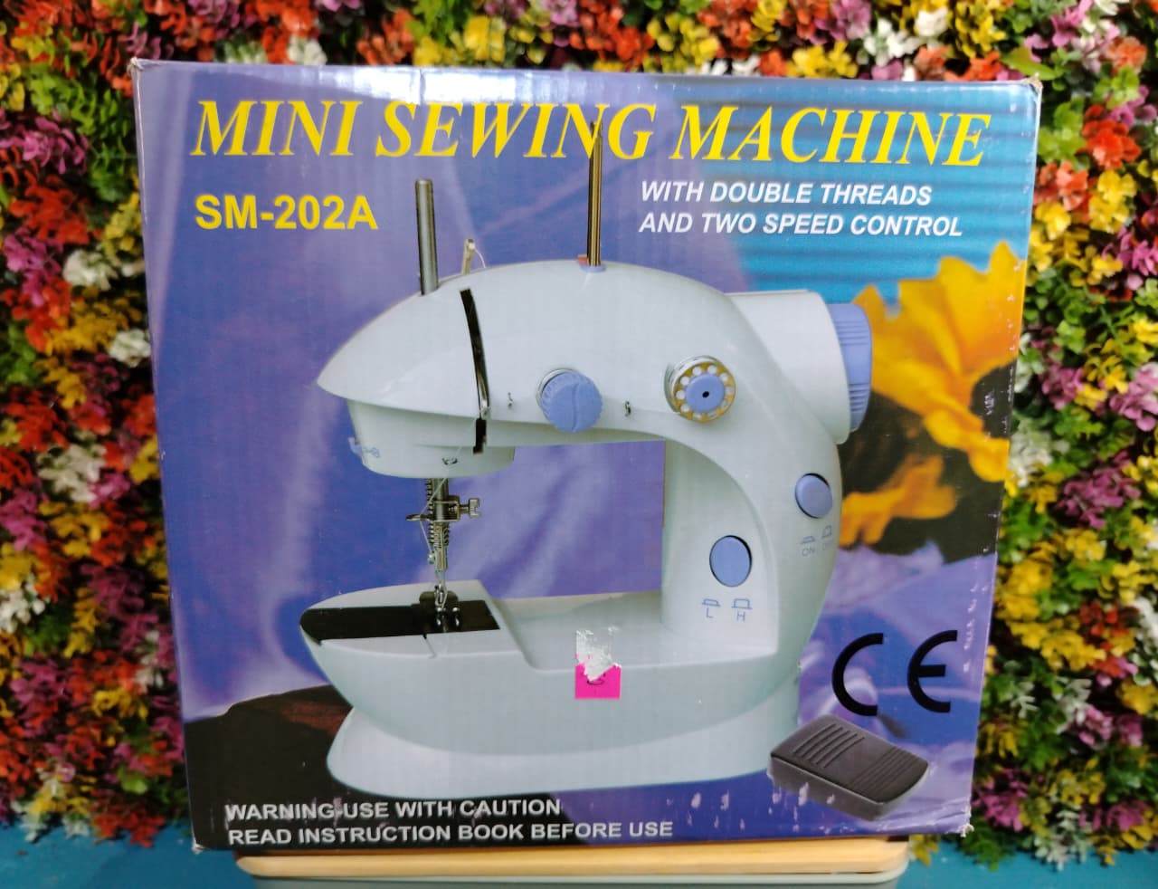 Mini Maquina de cocer