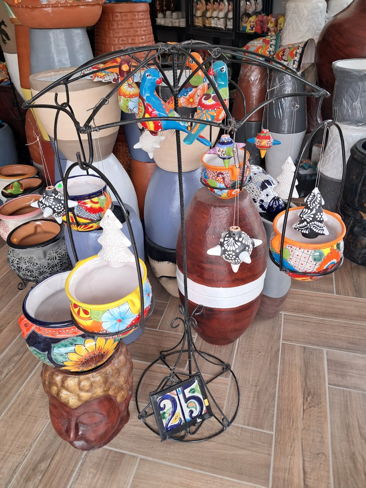 paraguas grande de fierro para macetas