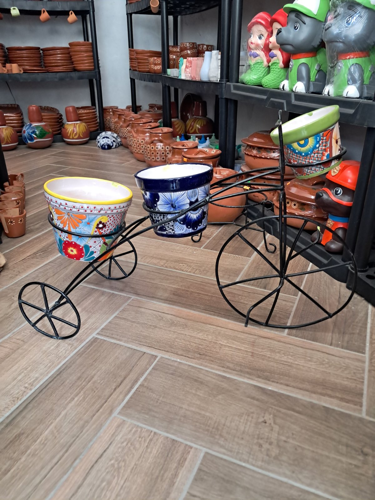 bicicleta de fierro para macetas