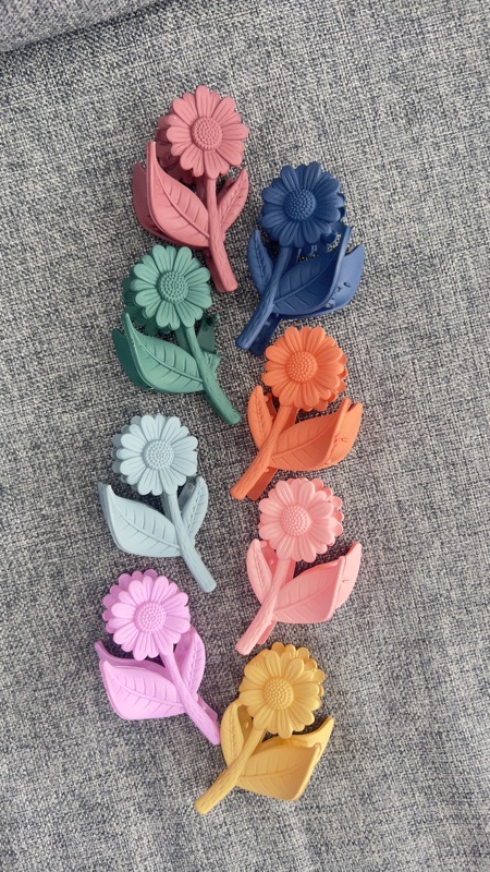 pinza flor margarita