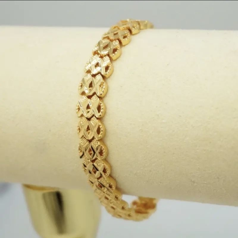 PULSERA TIPO BRAZALETE ANCHA CON GRABADOS FLOR 7MM