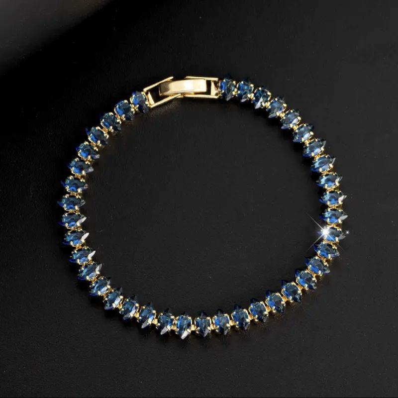 PULSERA DORADA TIPO TENIS CON CIRCONITA CUBICA AZUL 18CM
