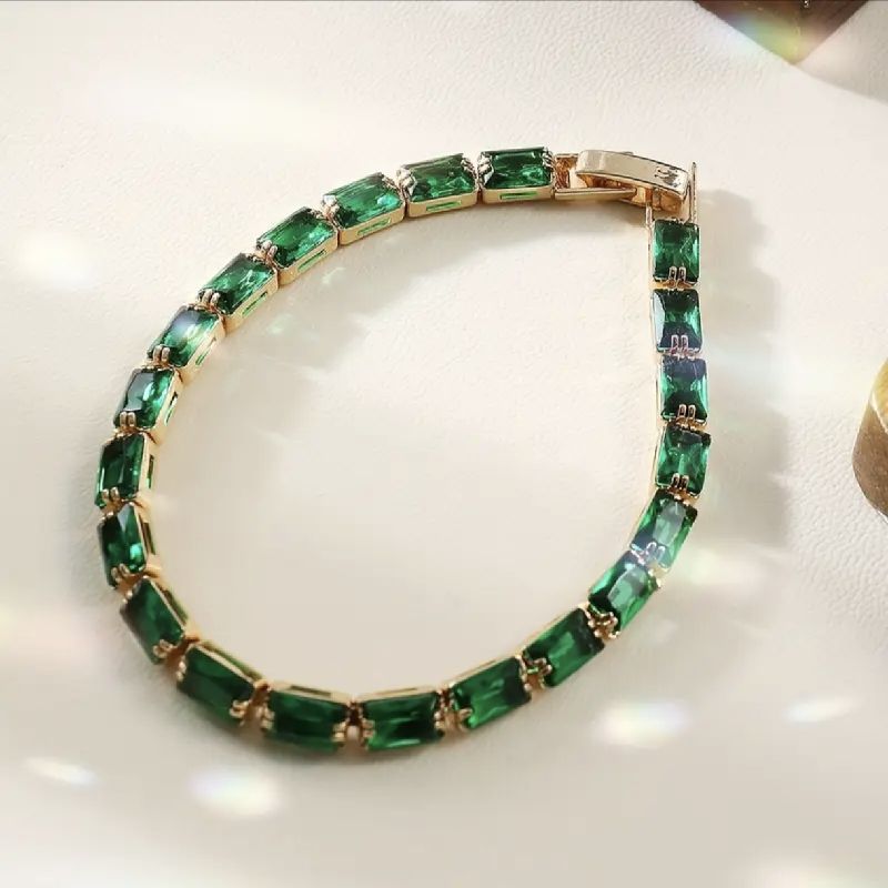 PULSERA CADENA DORADA TIPO TENIS CON PIEDRAS VERDES 18CM