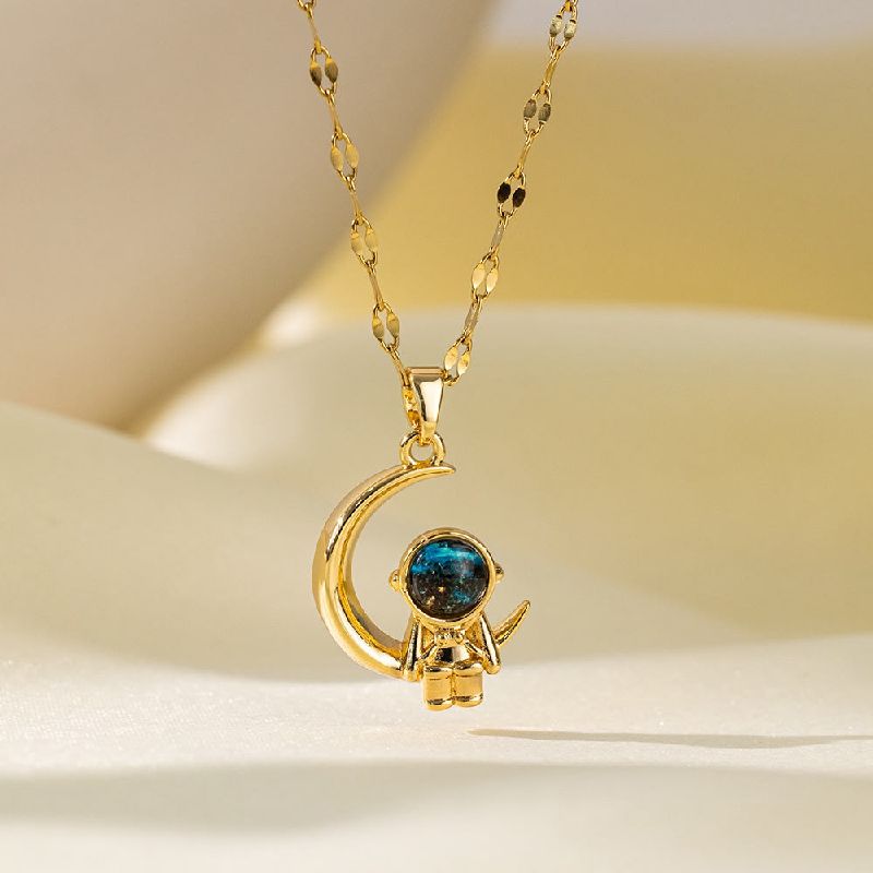 collar astronauta dorado