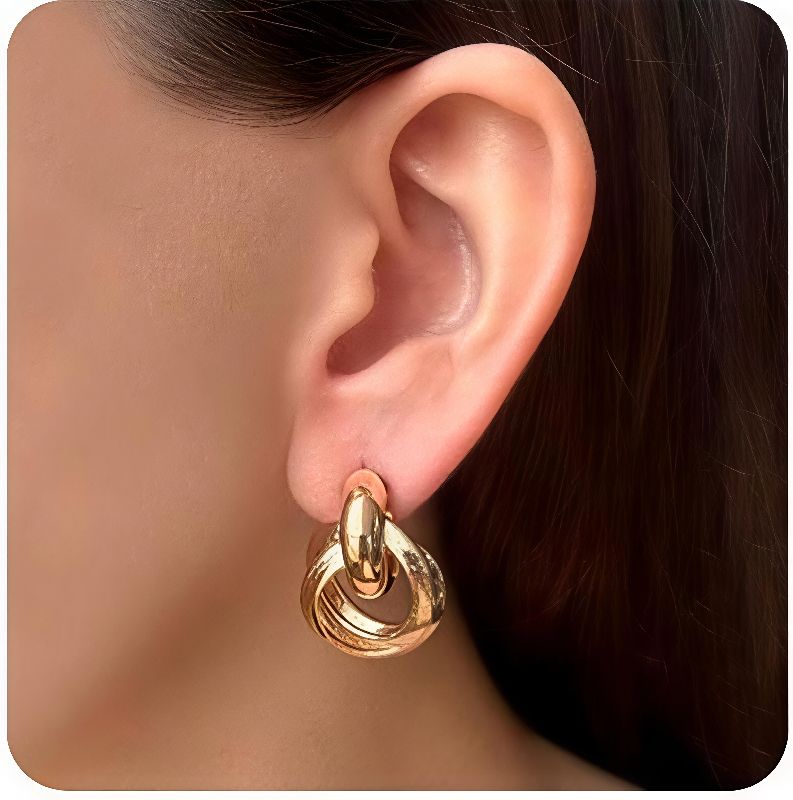 aretes aros dorados nudo