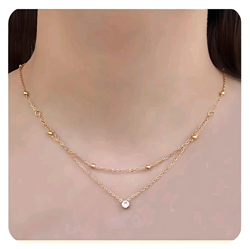 collar doble bolitas y zirconia dorado