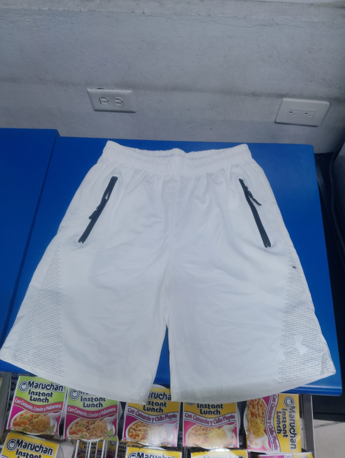 short deportivo mix con cierre
