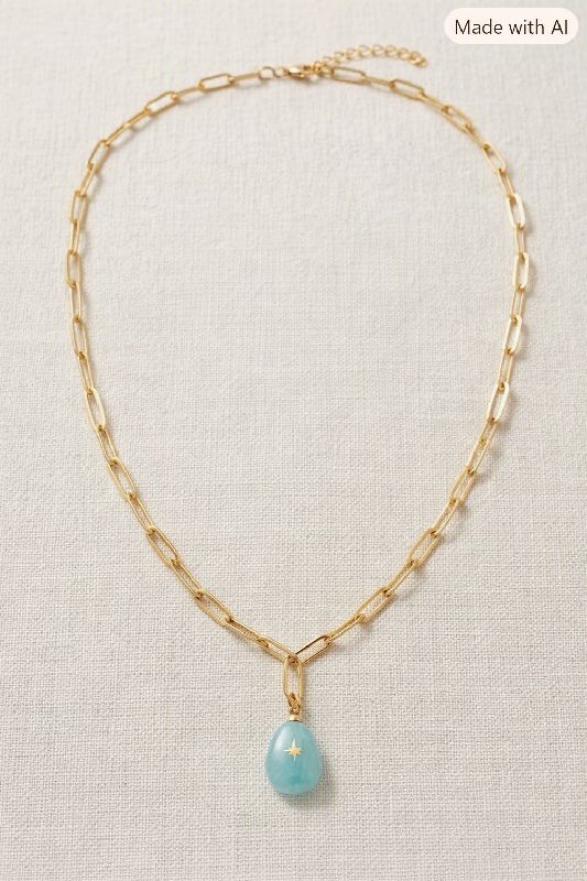 Cadena de eslabones y dije azul