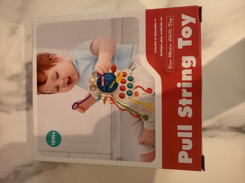 pulm string toy sensorial Azul