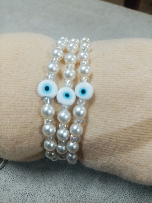 Pulsera perlas y ojo turco